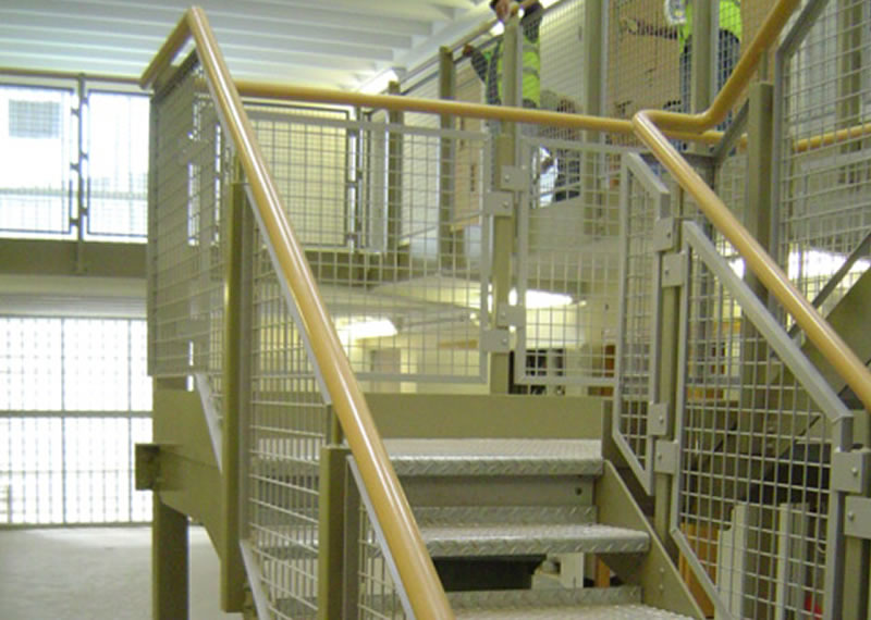 Painted mild steel staircase and balustrade to Her Majesty Prison at Nottingham UK